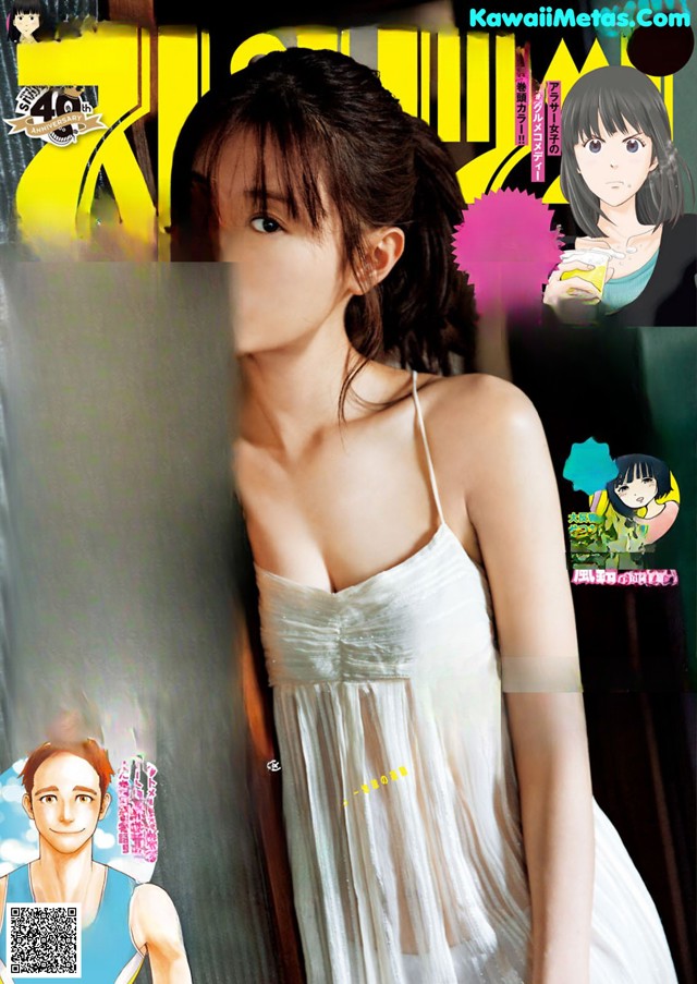 A woman in a white dress on a magazine cover.