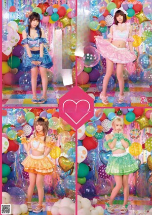 A group of girls in colorful outfits posing for a picture.