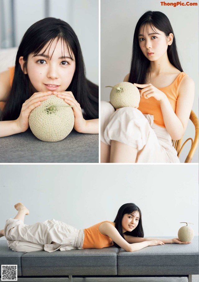 A woman laying on a couch holding a melon.